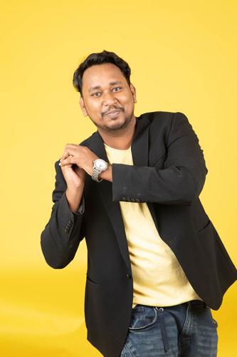 jj jitu jitendra black suit pose